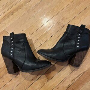 Black Coach booties with silver stud details